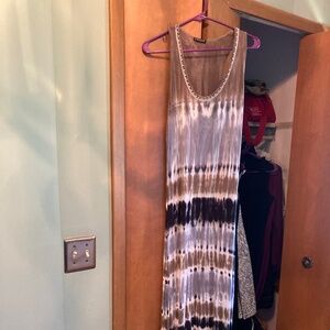 Tie dye maxi dress with rhinestone neckline .